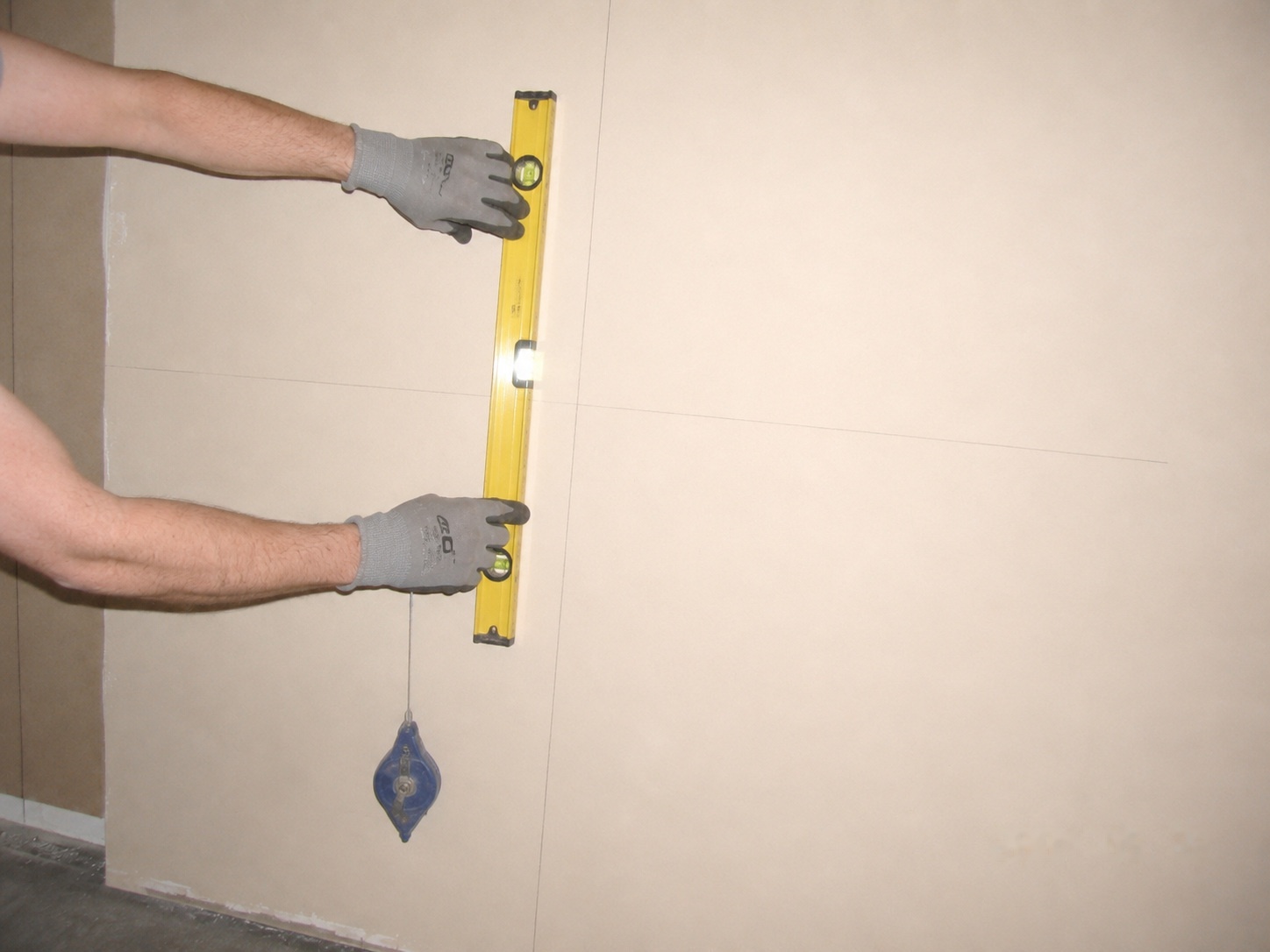 A true vertical and horizontal through the center — checked with the level, never eyeballed.